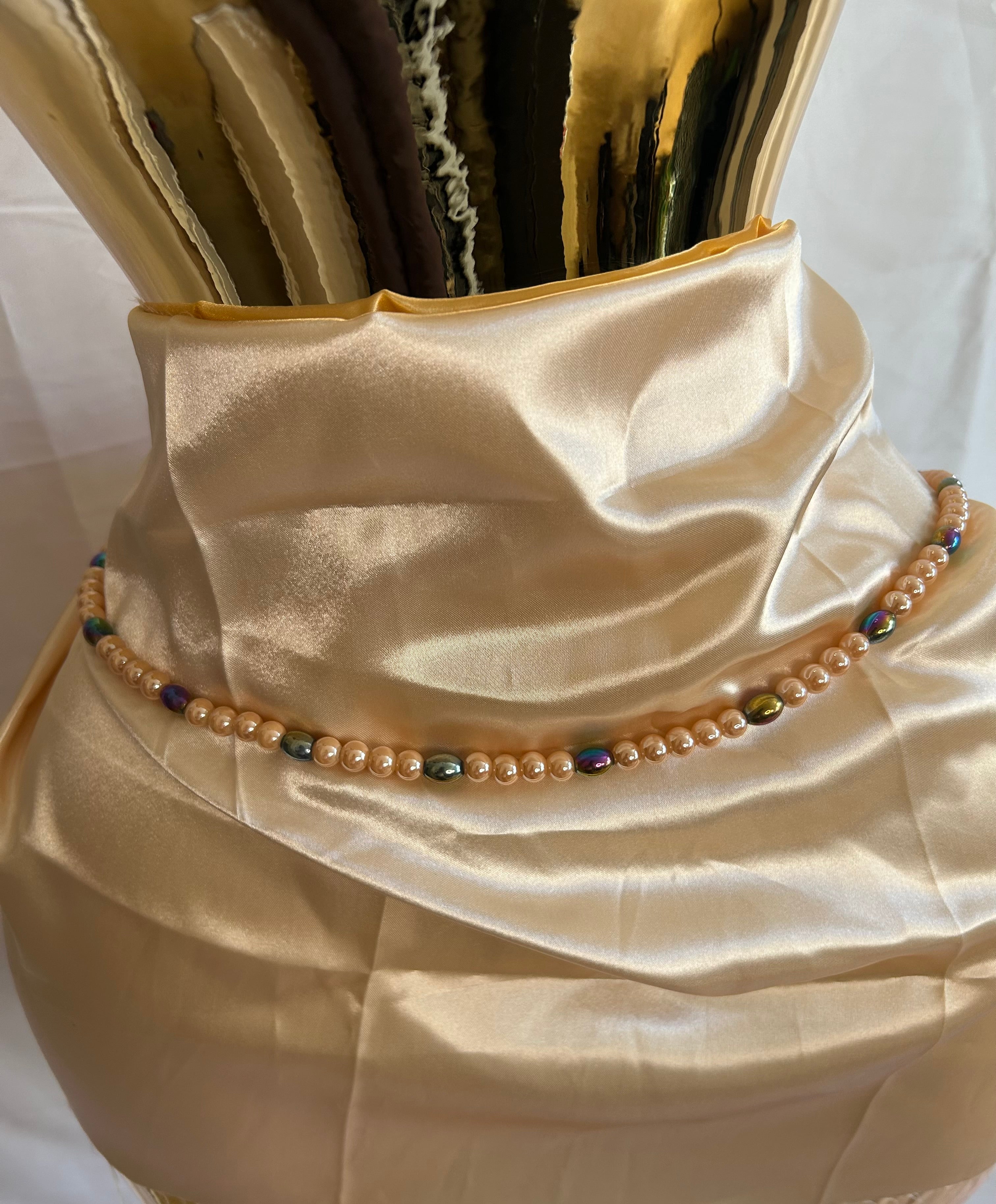 Baya orne de grosse perle