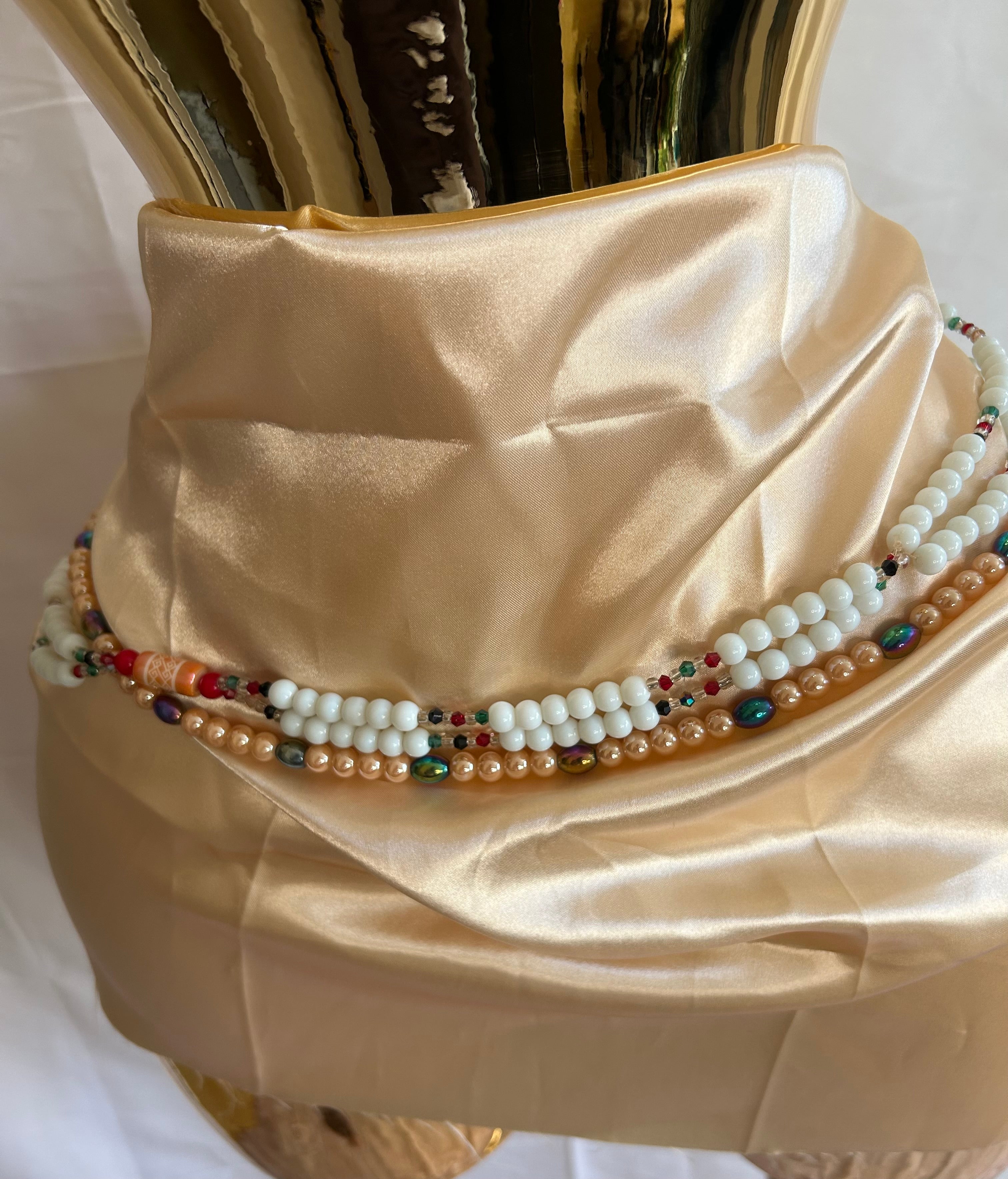 Baya orne de grosse perle