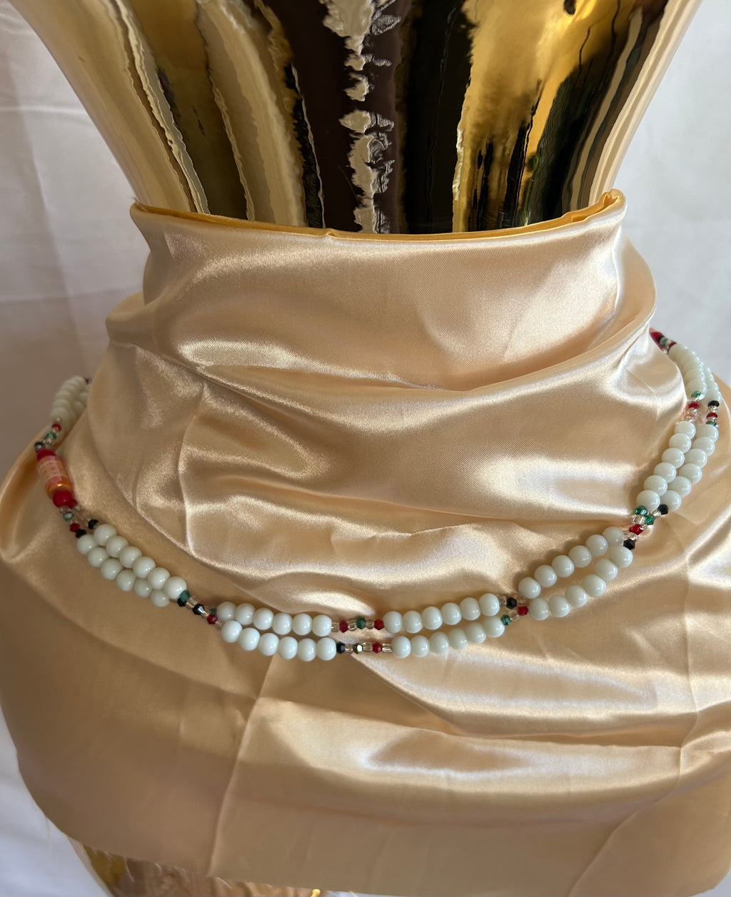 Baya orne de grosse perle