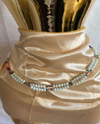 Baya orne de grosse perle