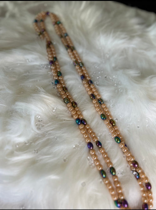 Baya orne de grosse perle