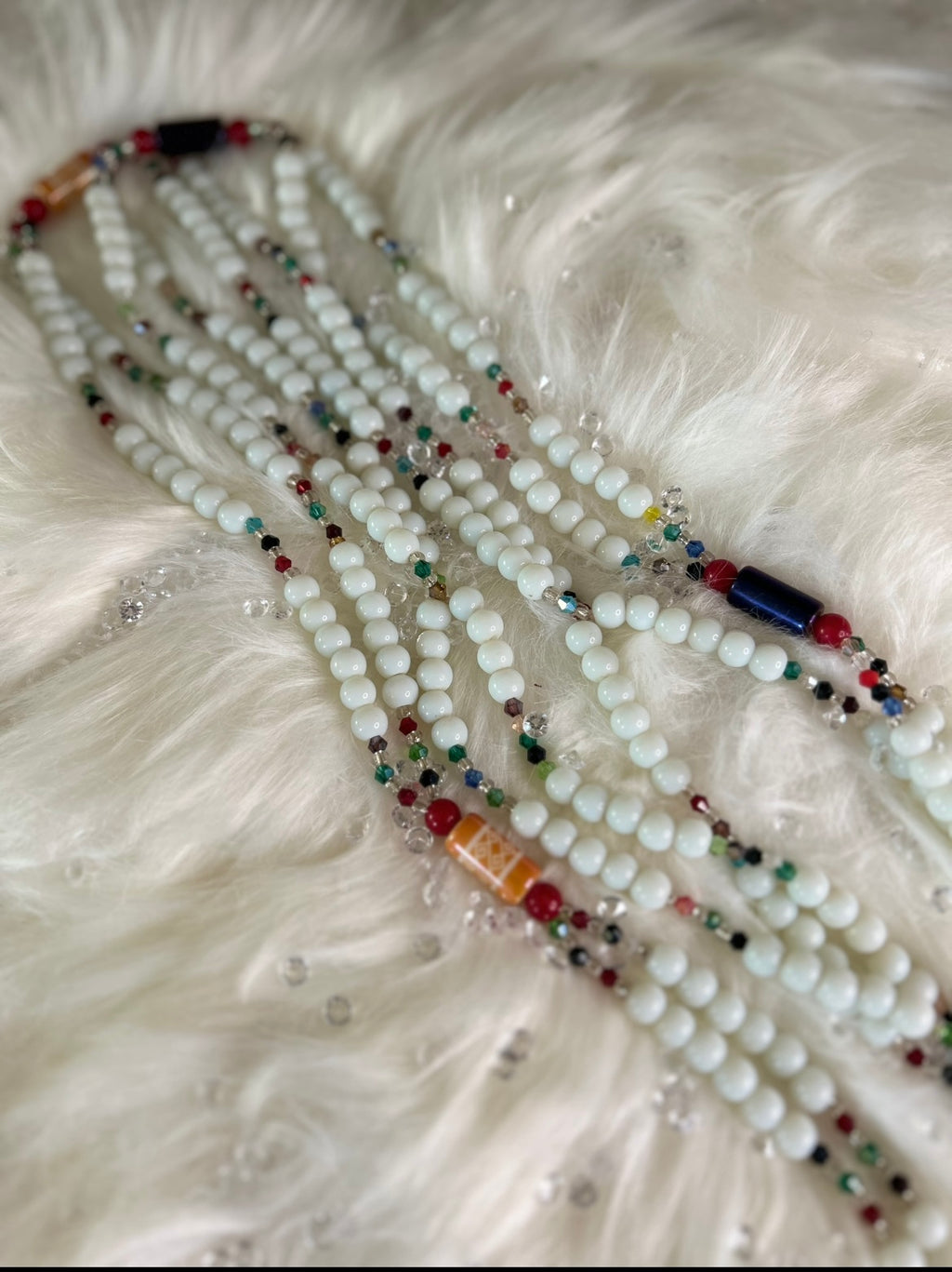 Baya orne de grosse perle